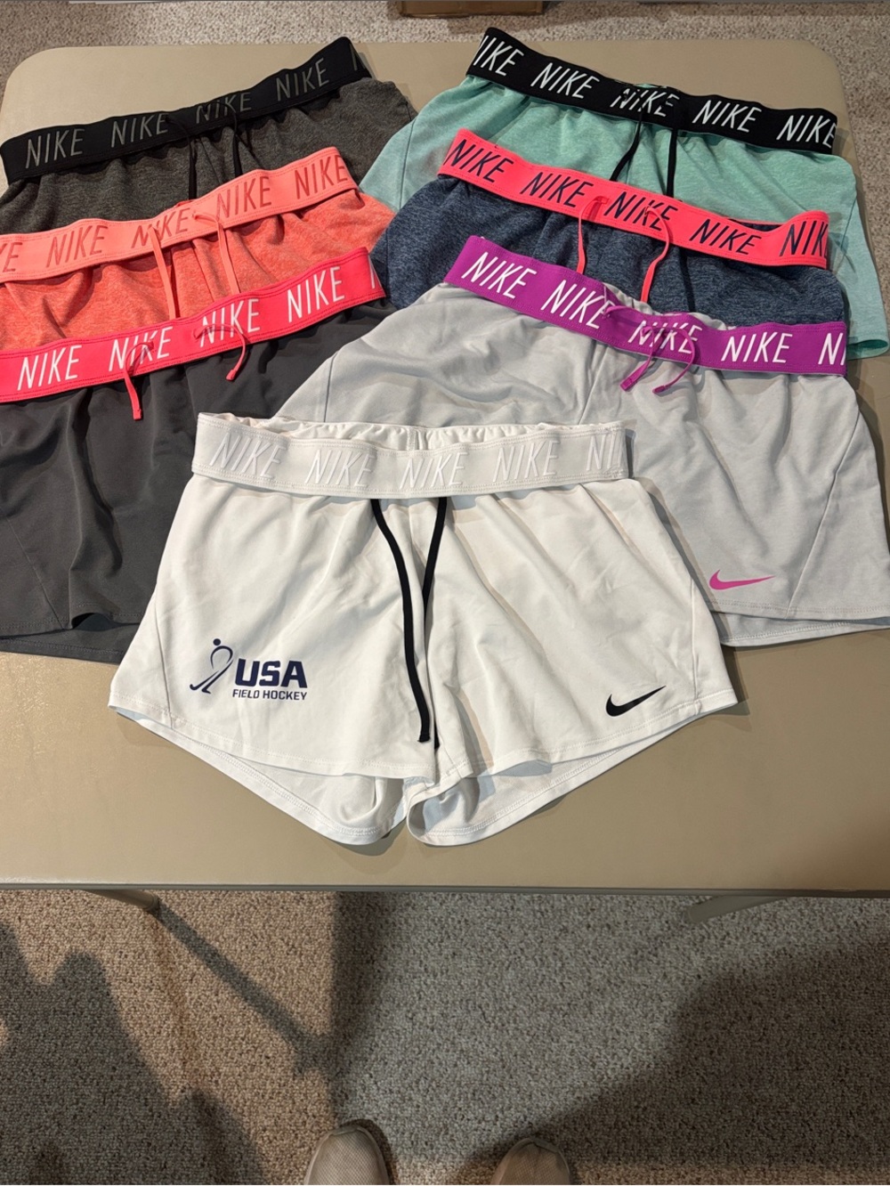 7 Pairs of Nike Women’s Athletic Shorts with Nike Logo (some new/no tags) Size S